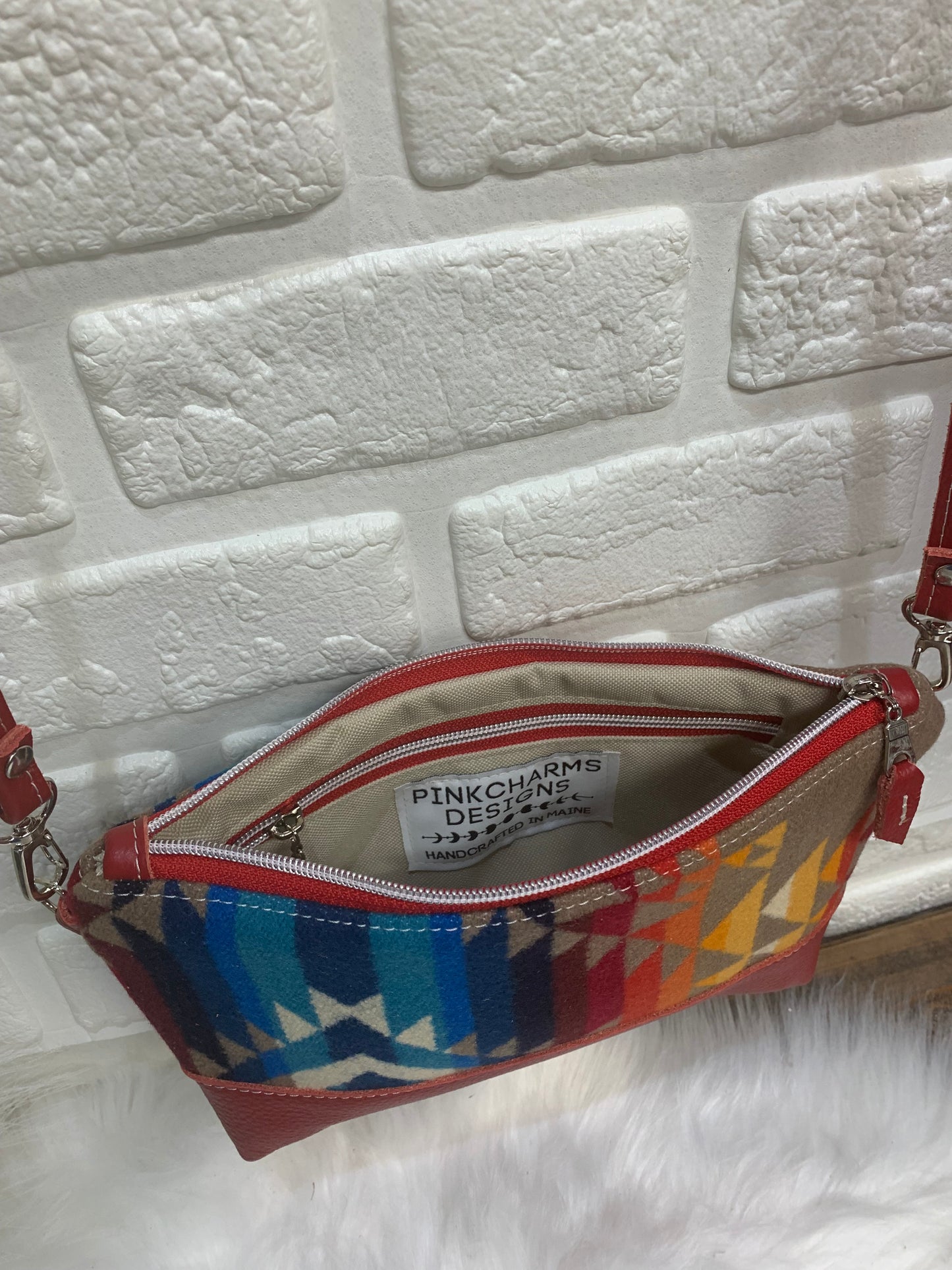 Ruby crossbody bag wool and leather, red pebble grain leather bottom