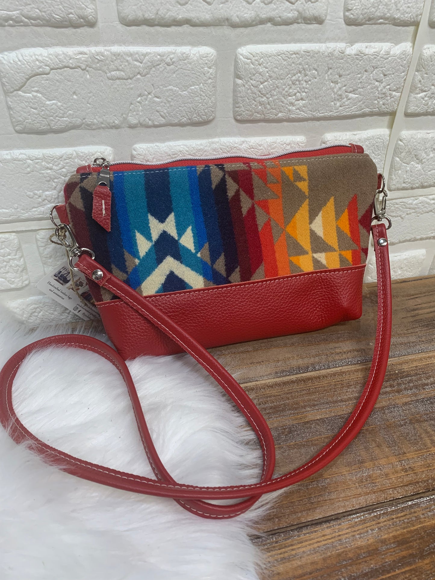 Ruby crossbody bag wool and leather, red pebble grain leather bottom