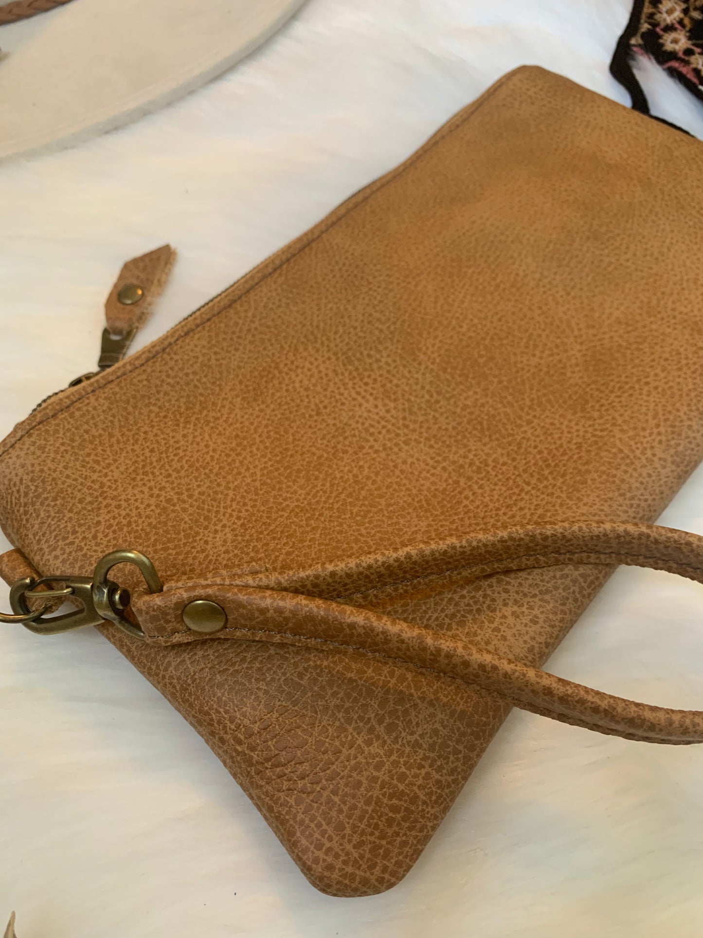 Caramel two toned leather clutch wristlet