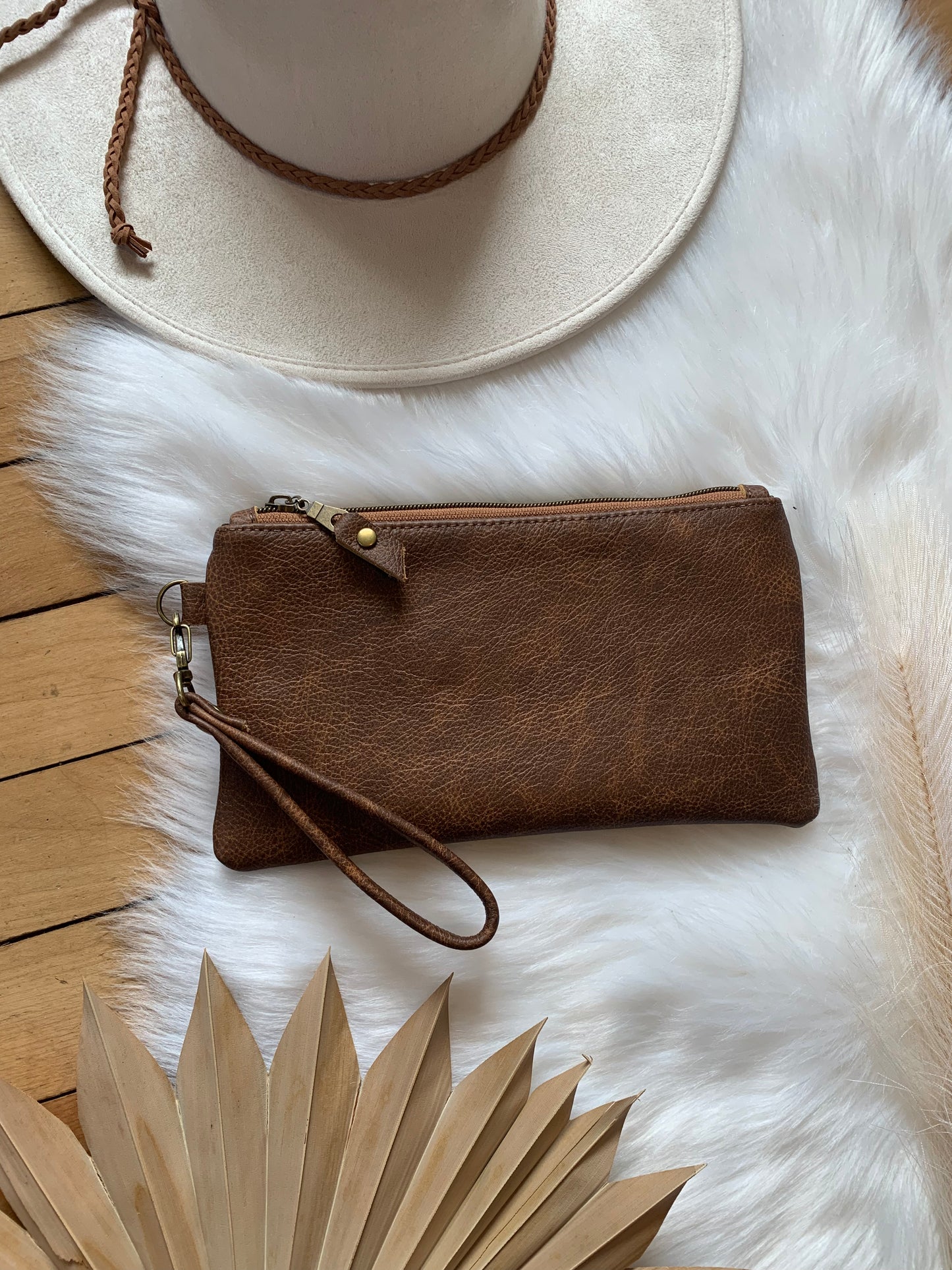 Saddle brown two toned leather clutch wristlet