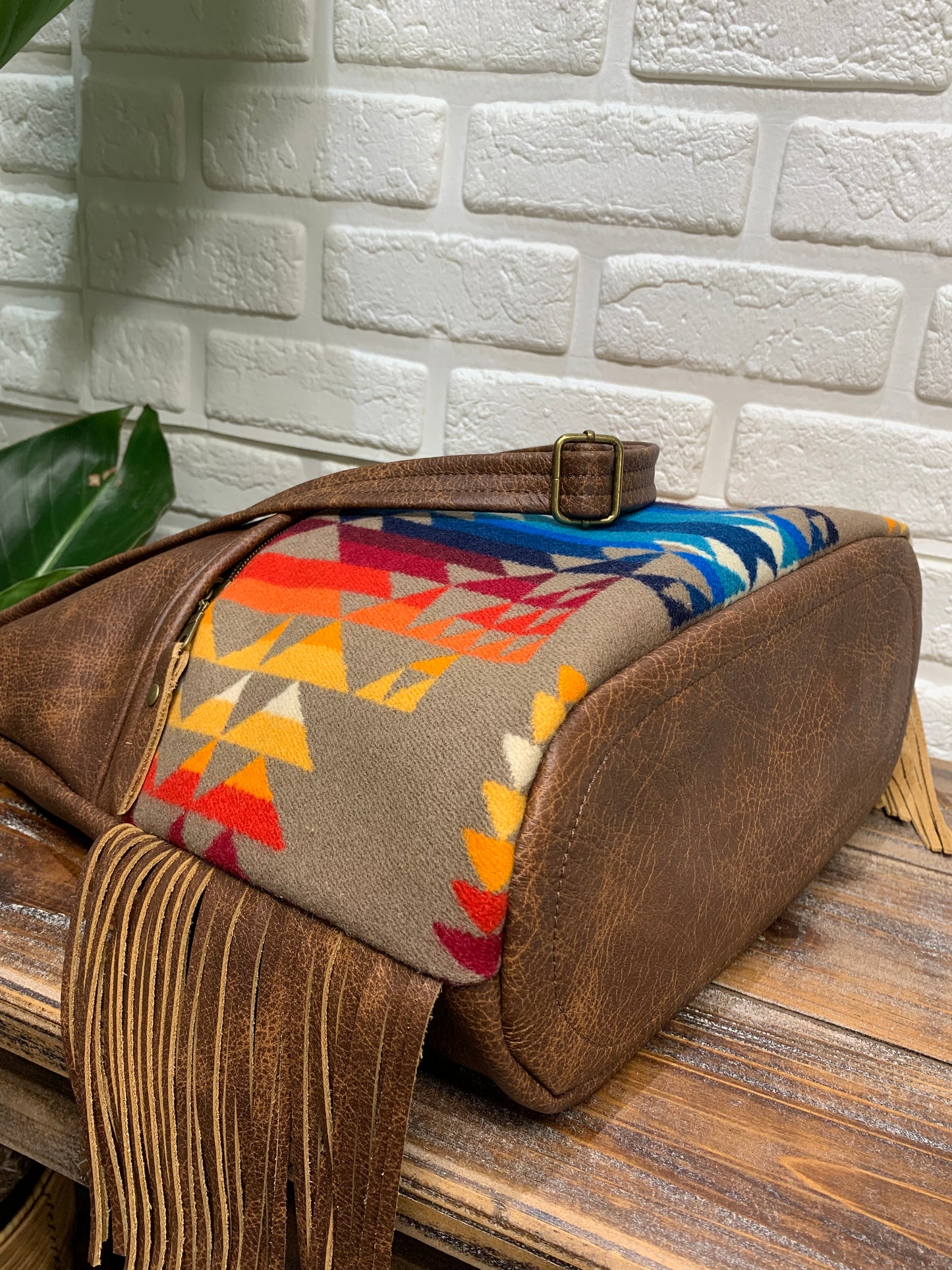 Bucket hobo bag crossbody in Pilot Rock wool and saddle brown leather with Fringe