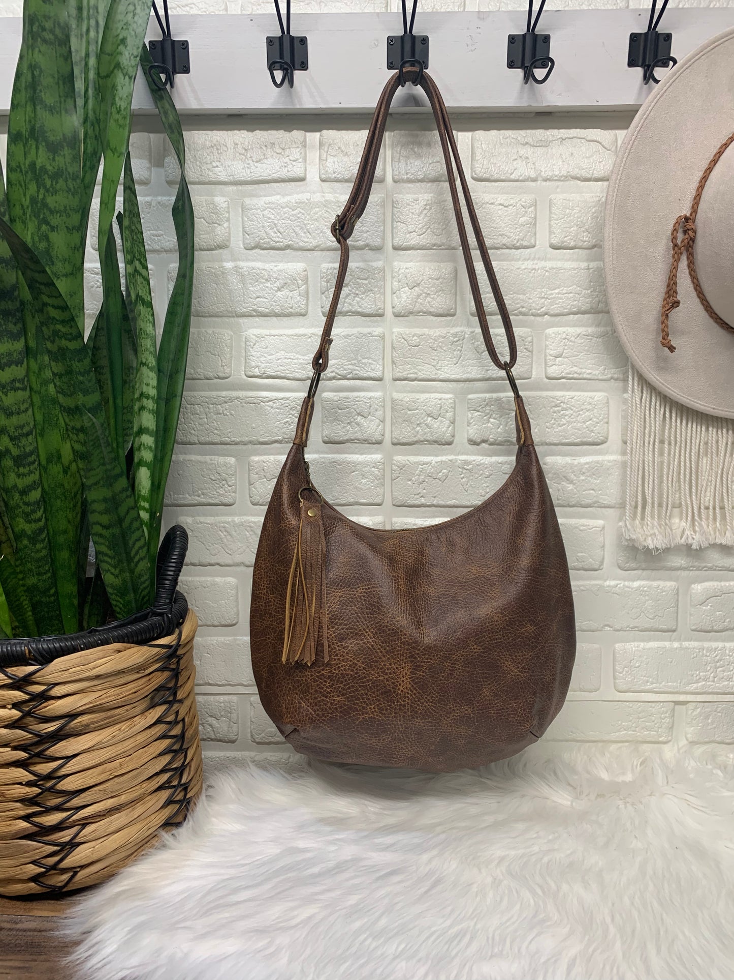 Saddle brown leather crossbody hobo bag, canvas lining, zipper closure, handmade, genuine leather