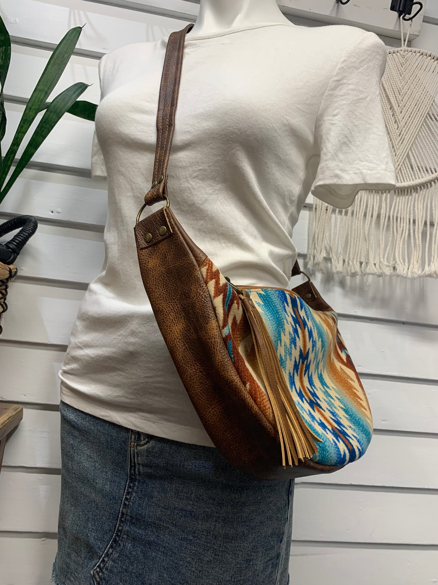 Half moon crossbody hobo bag Pagosa springs wool, saddle brown leather