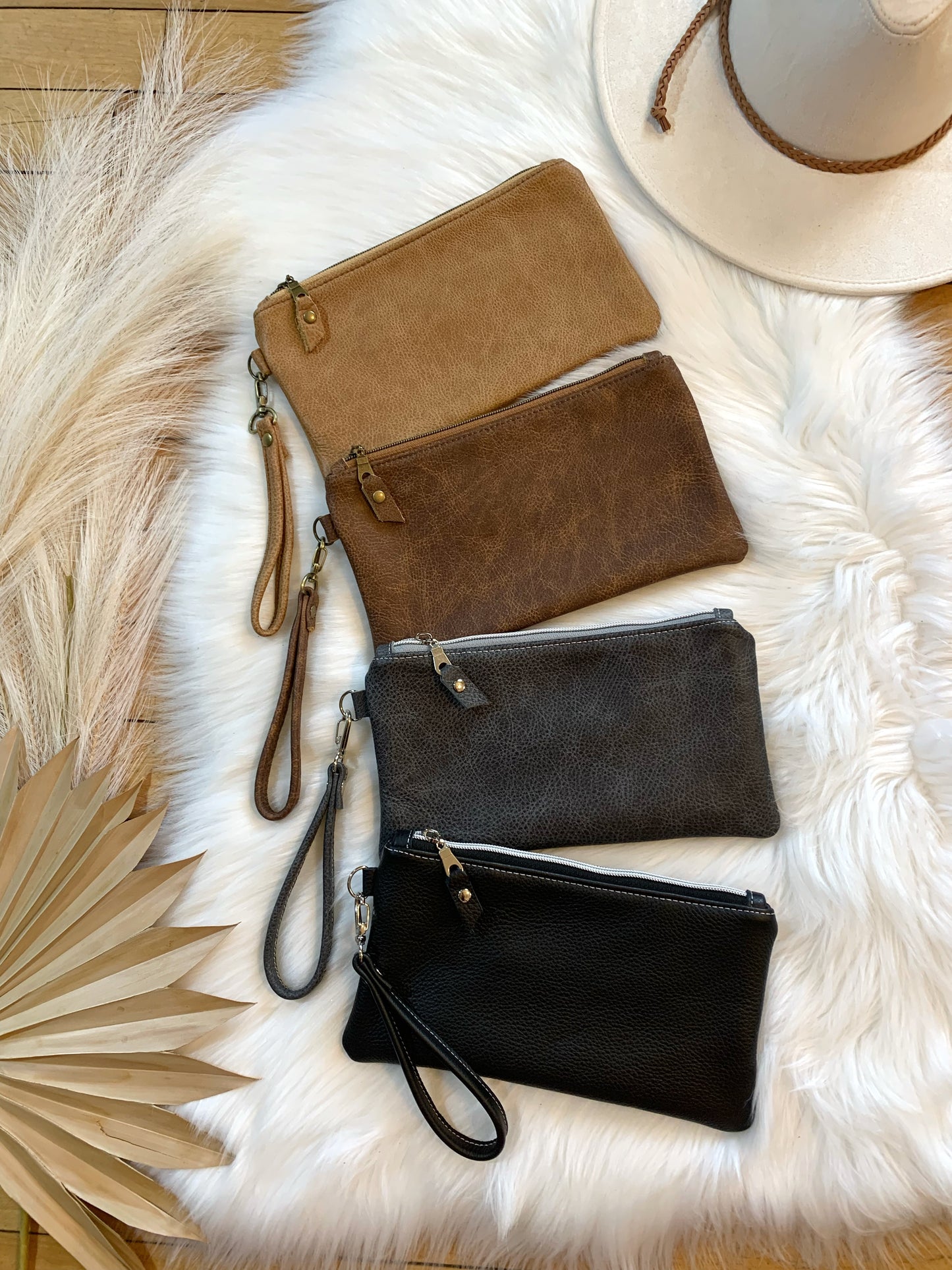 Saddle brown two toned leather clutch wristlet