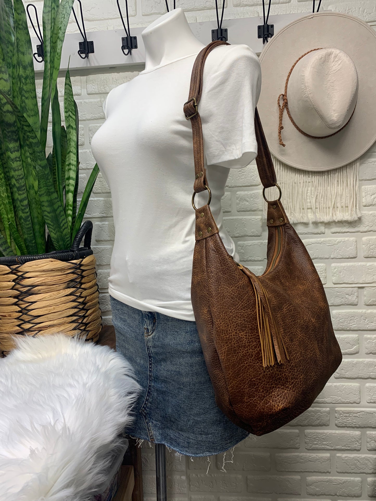 Saddle brown leather crossbody hobo bag, canvas lining, zipper closure, handmade, genuine leather