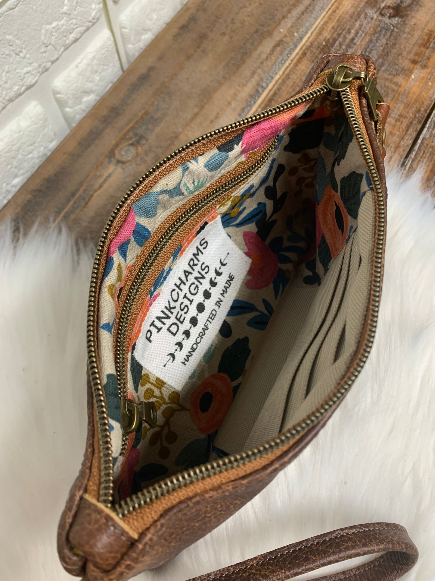 Saddle brown two toned leather clutch wristlet