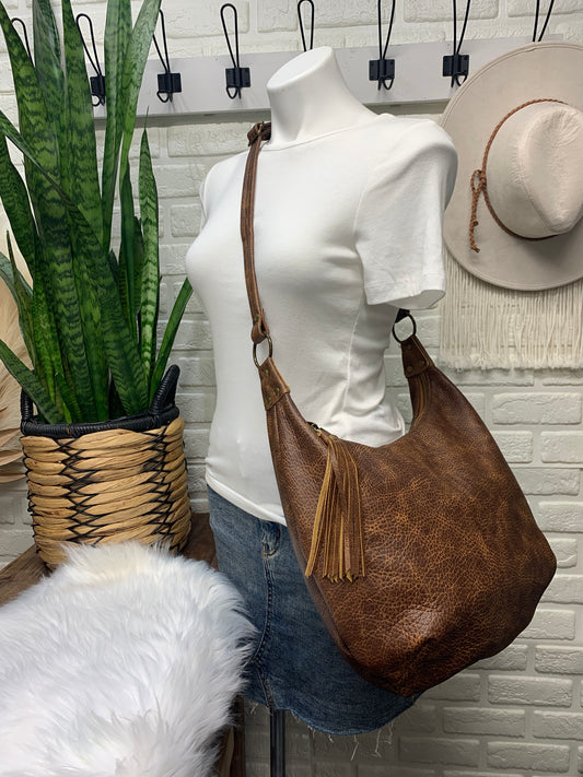 Saddle brown leather crossbody hobo bag, canvas lining, zipper closure, handmade, genuine leather