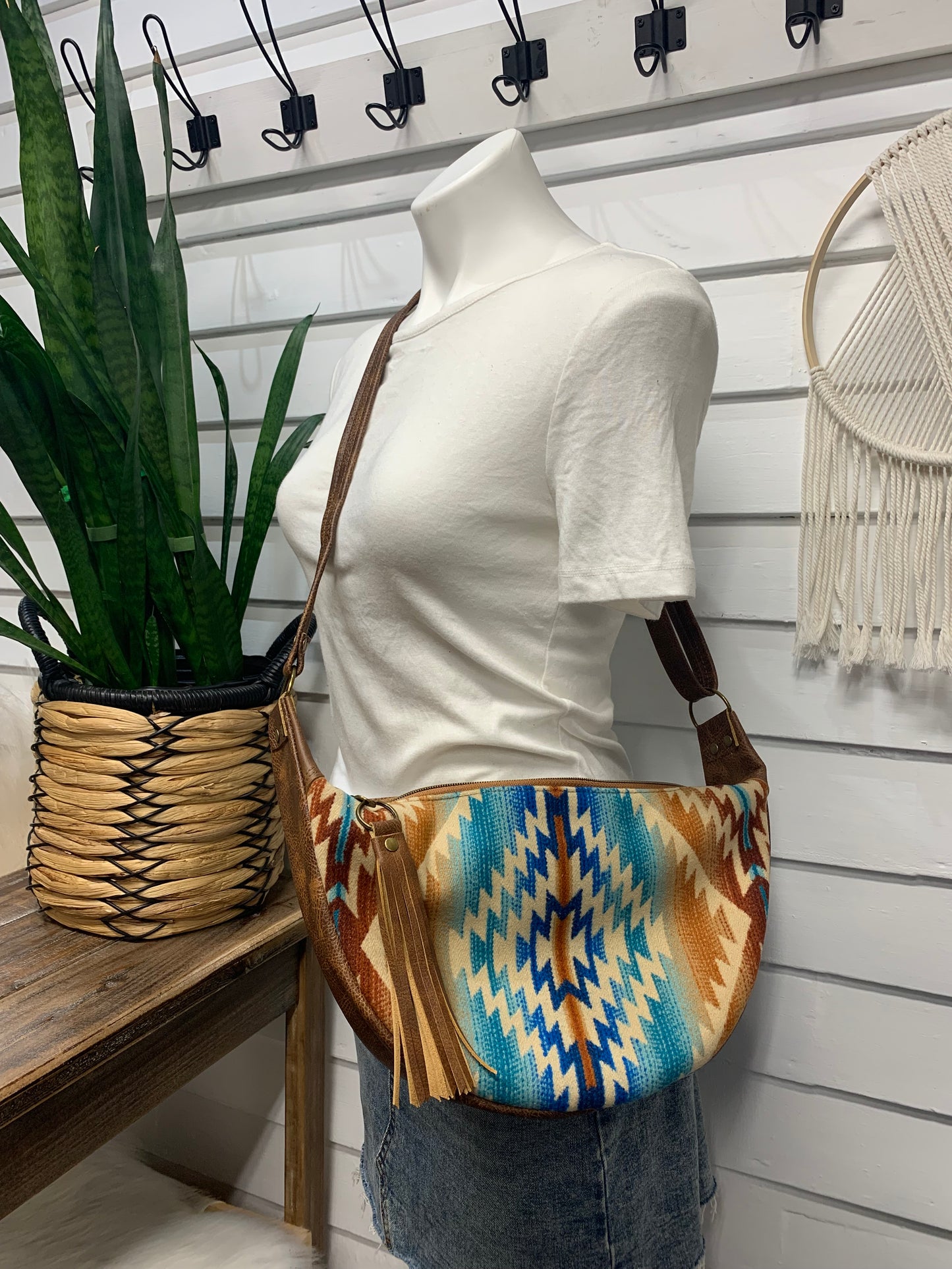 Half moon crossbody hobo bag Pagosa springs wool, saddle brown leather