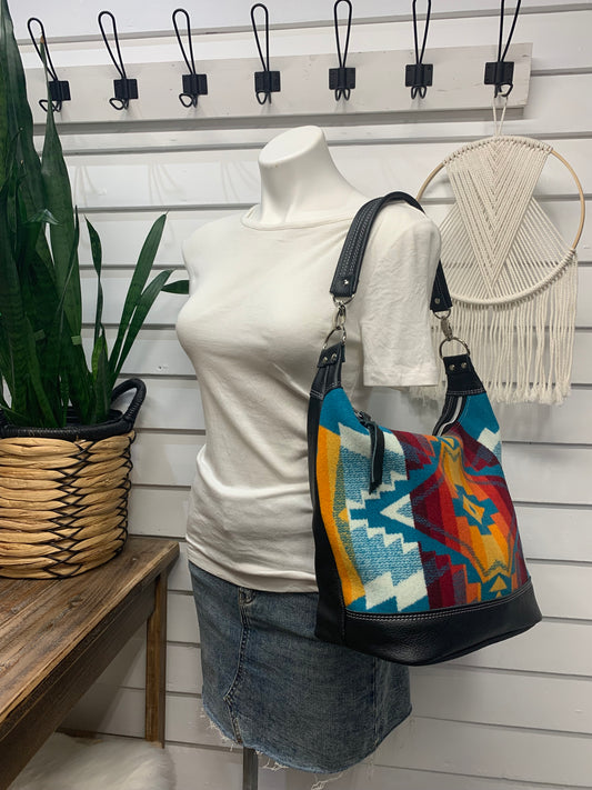 Jasper Bucket bag, All Over Turquoise wool, black leather